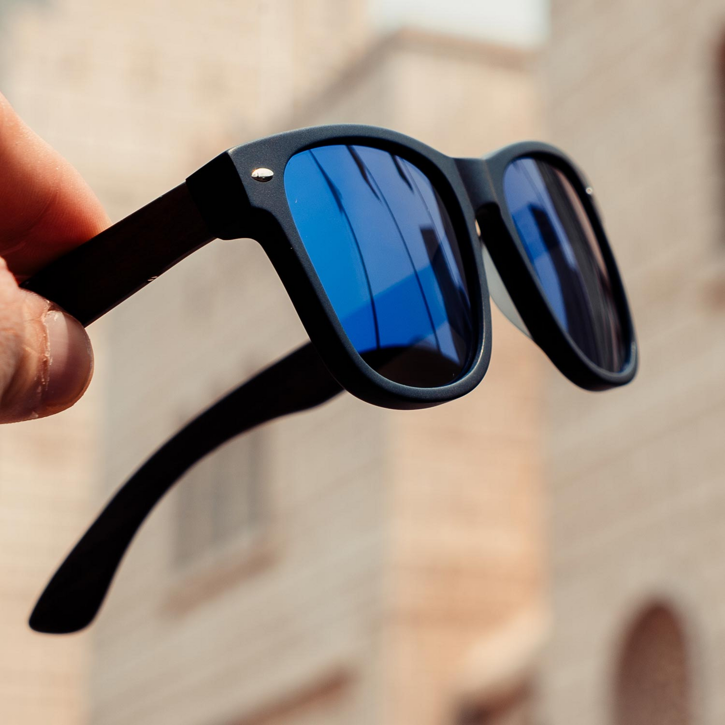 Ebony wood classic style sunglasses with blue mirrored polarized lenses